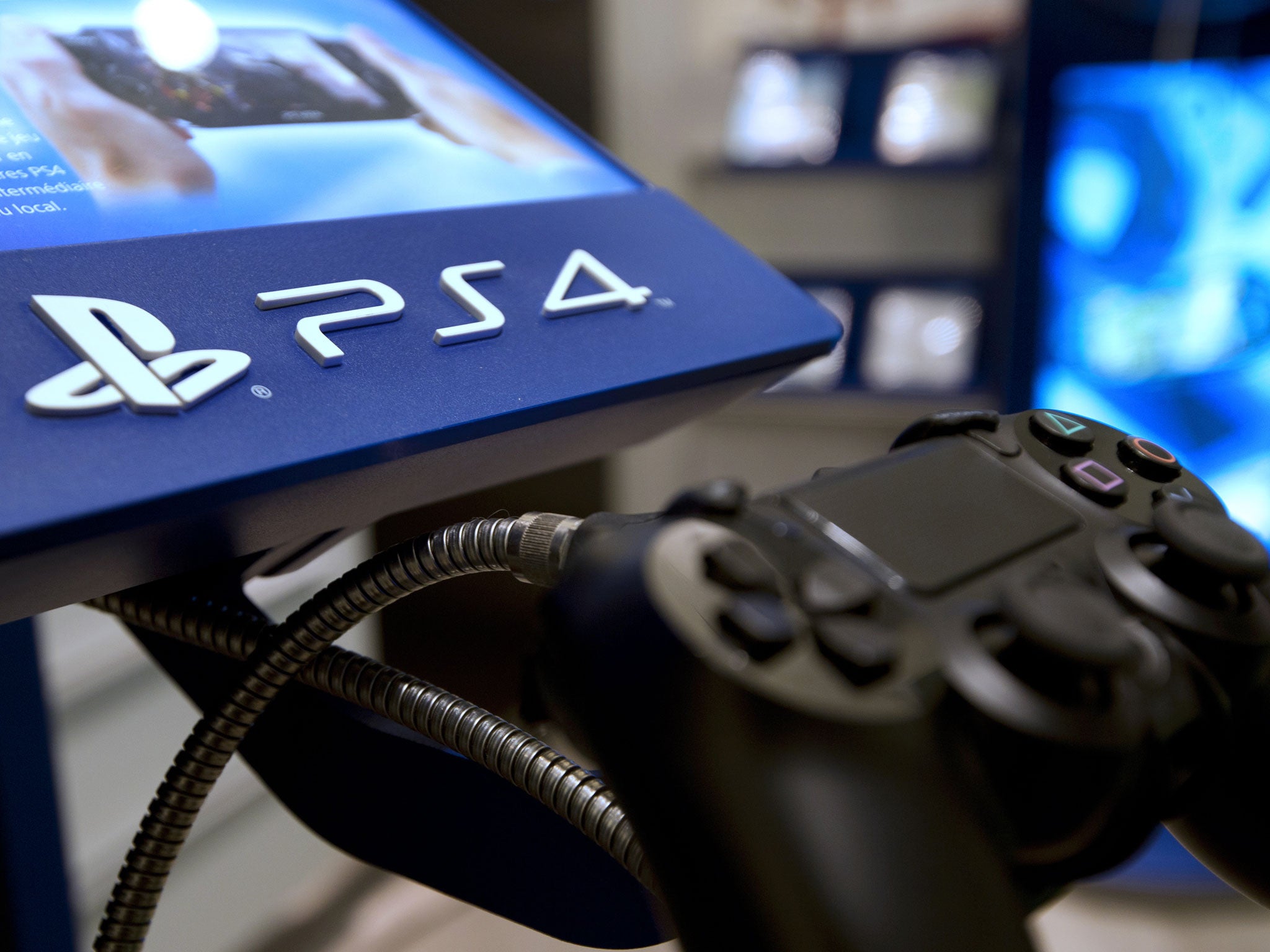 A picture taken on November 29, 2013 in a Parisian store shows the joystick of the new Sony Playstation 4 video game console (PS4).