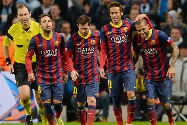 Barcelona players celebrate Dani Alves' goal - which may have put the tie beyond Manchester City