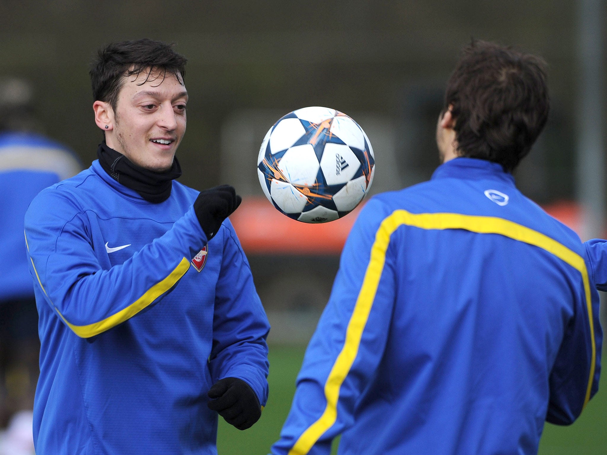 Mesut Ozil pictured training with Arsenal