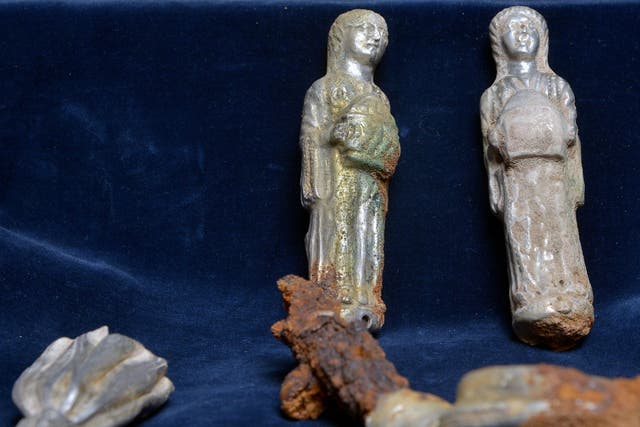 Silver statuettes and metal fittings of a general's chair from late antiquity, which are part of a 'Barbarian Treasure' illegally excavated in the Palatinate