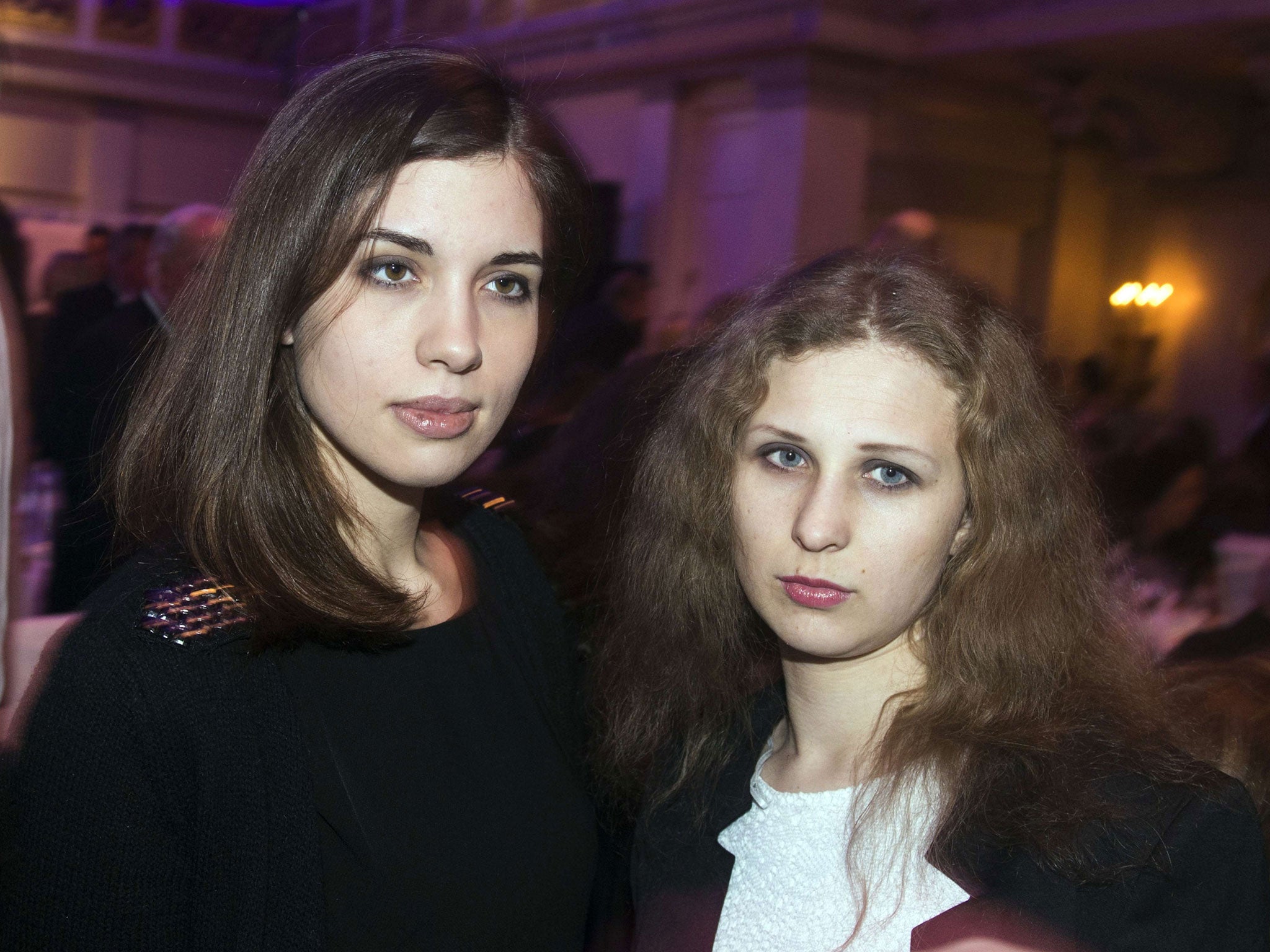 Nadezhda Tolokonnikova (L) and Maria Alyokhina of the Russian punk protest group Pussy Riot arriving for the Cinema for Peace gala in Berlin, 2014