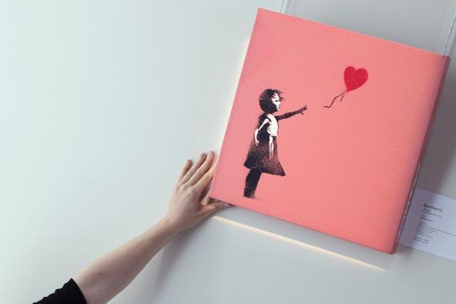 An image of 'Girl with Red Balloon' - the original has been removed by a team of specialists
