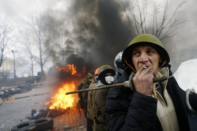 Protesters shape a defence line in Kiev, Ukraine