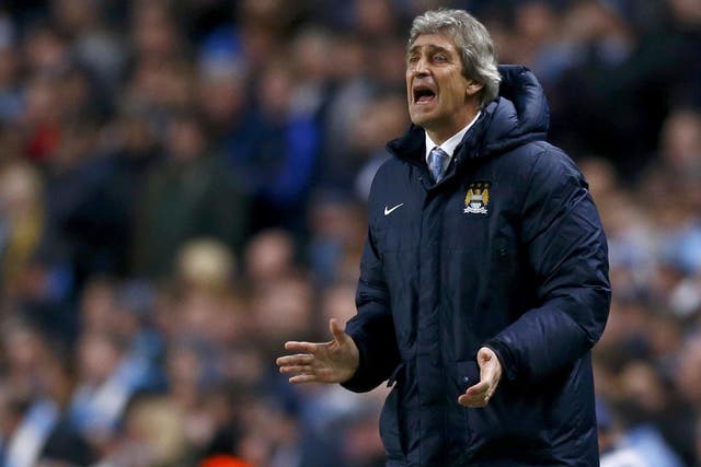 Manuel Pellegrini make a gesture from the touchline