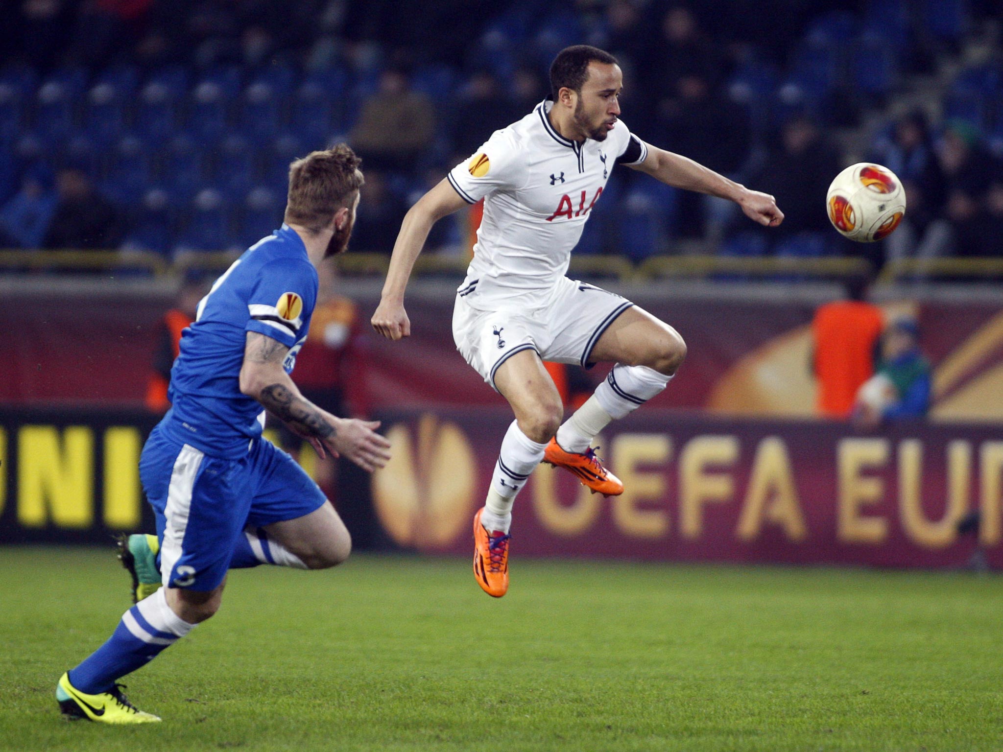 Ondrej Mazuch (L) of FC Dnipro and Andros Townsend (R) Tottenham Hotspur FC vie for the ball