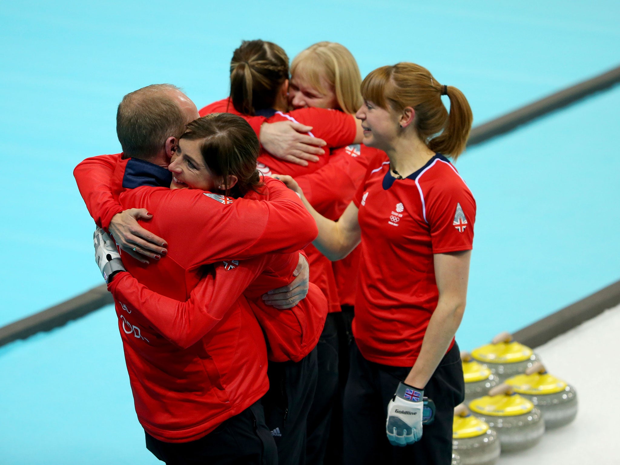 Team Muirhead celebrate with coaches Rhona Howie and David Hay after securing Olympic bronze