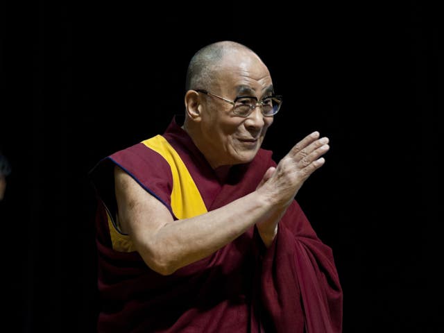 Tibetan spiritual leader the Dalai Lama is introduced to guests during the Conversations with His Holiness the Dalai Lama at Ryogoku Kokugikan on November 25, 2013 in Tokyo, Japan. The Dalai Lama spoke with guests on 'Making the best use of the wisdom of Buddhism in daily life.' The Dalai Lama on a 12-day visit to Japan.