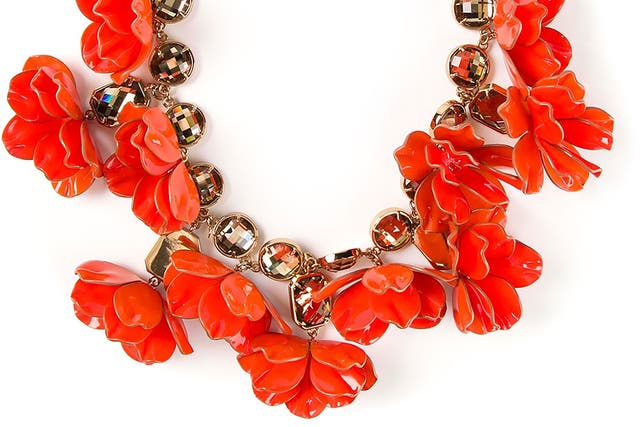 Floral necklace from Tory Burch, £427, farfetch.com