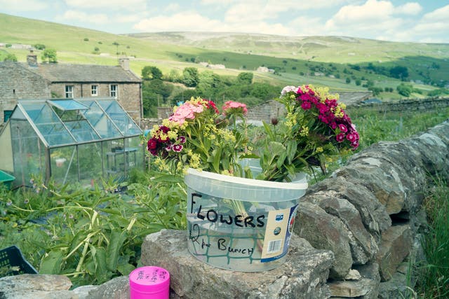 Flower power: There's something special about items put out for sale by the side of the road with only an honesty box for company