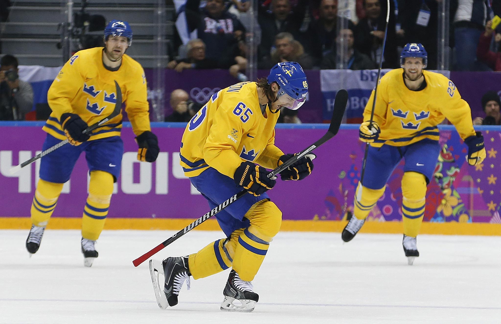 Sweden defenseman Erik Karlsson reacts after scoring a goal against Finland