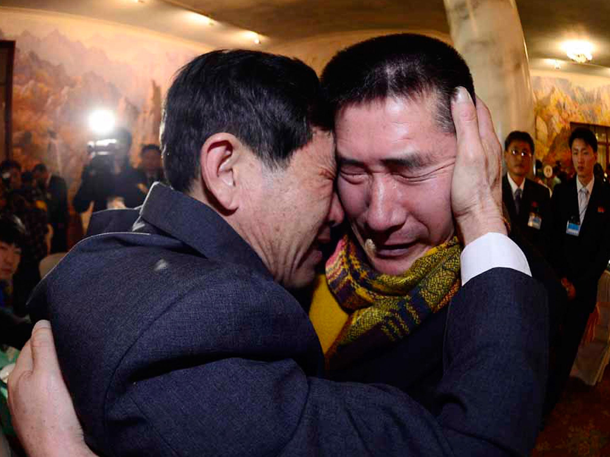 South Korean Park Yang-Gon (L) meets with his North Korean brother Park Yang-Soo during a family reunion after being separated for 60 years on February 20.