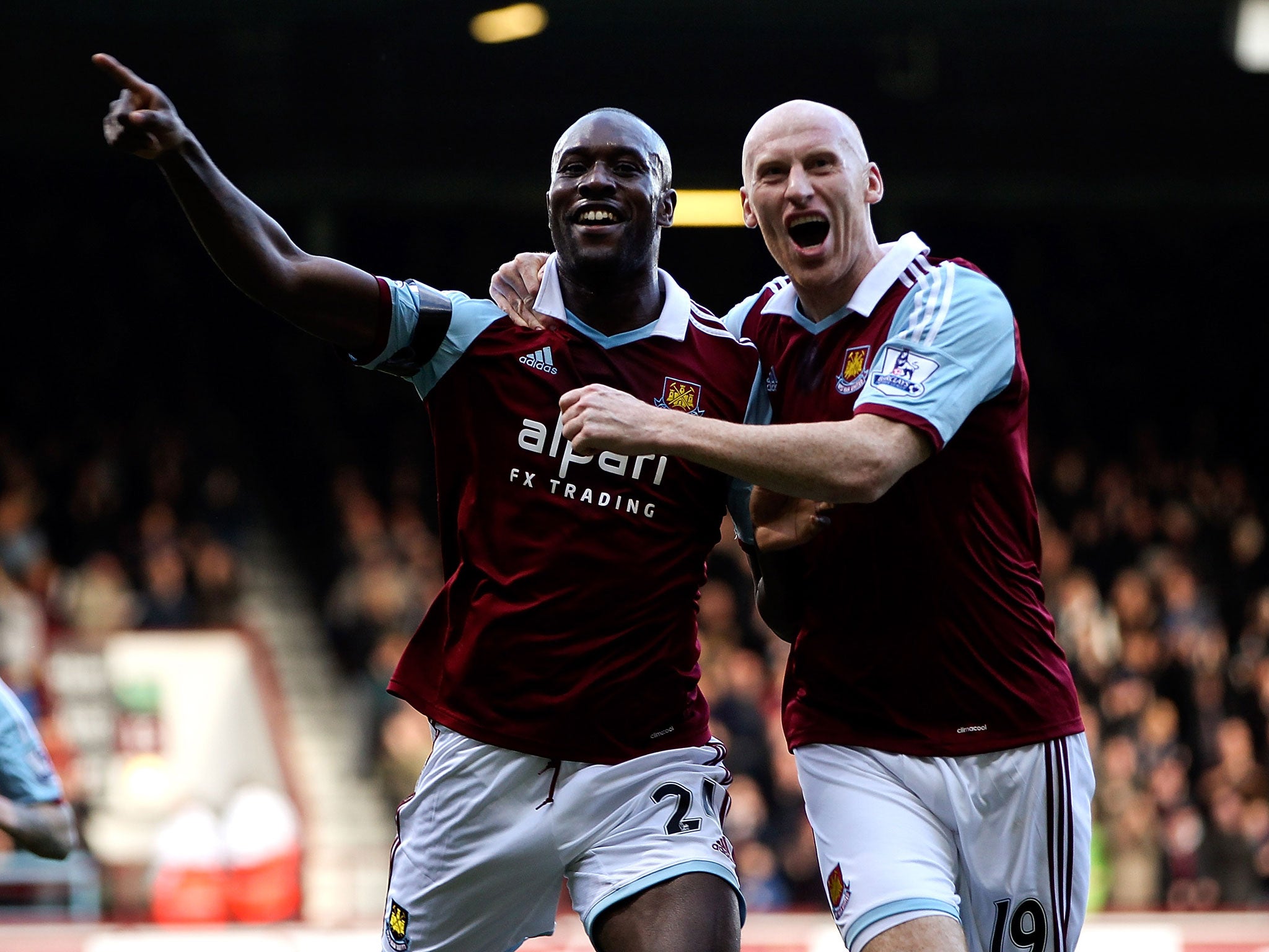 Carlton Cole celebrates his goal with Jame Collins as West Ham win