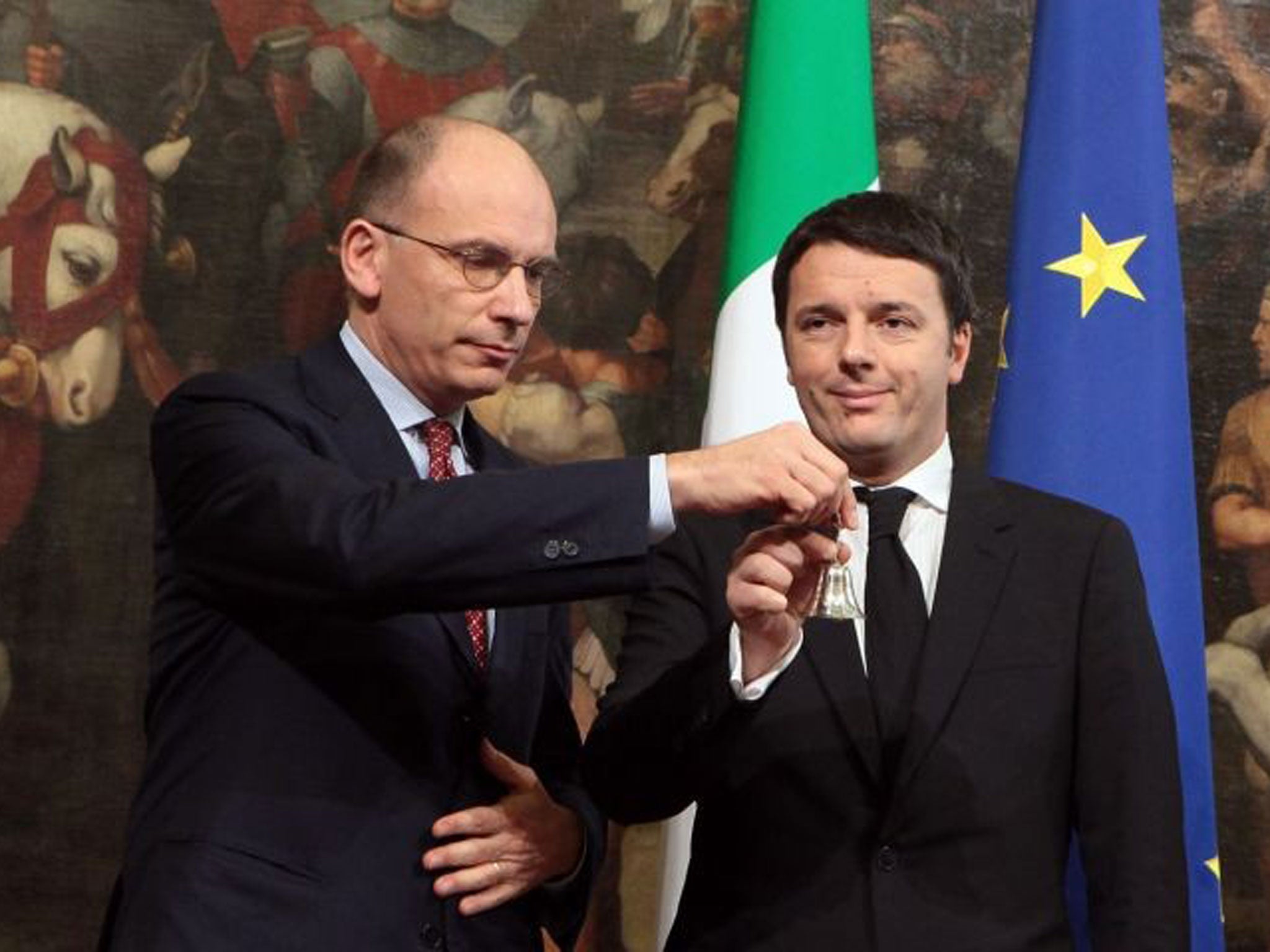Matteo Renzi (right), with outgoing PM Enrico Letta, at the handover ceremony in Rome yesterday