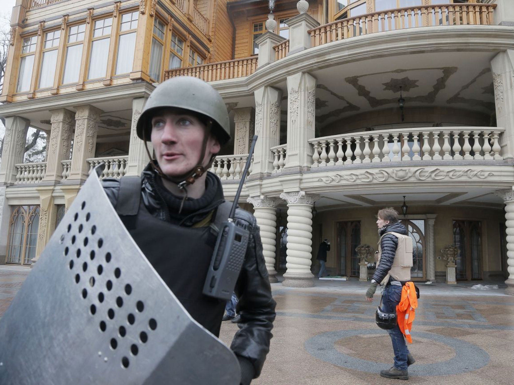 A protester outside the presidential residence