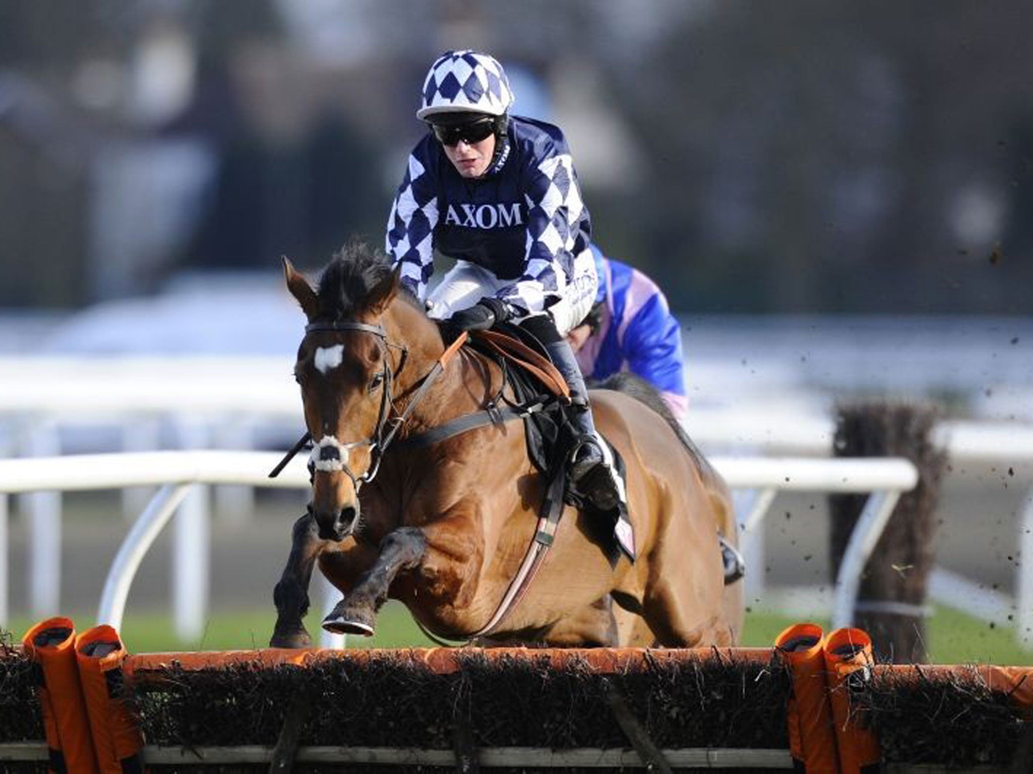 Blazing away: Irving pulls clear to win the Novices’ Hurdle at Kempton by five lengths