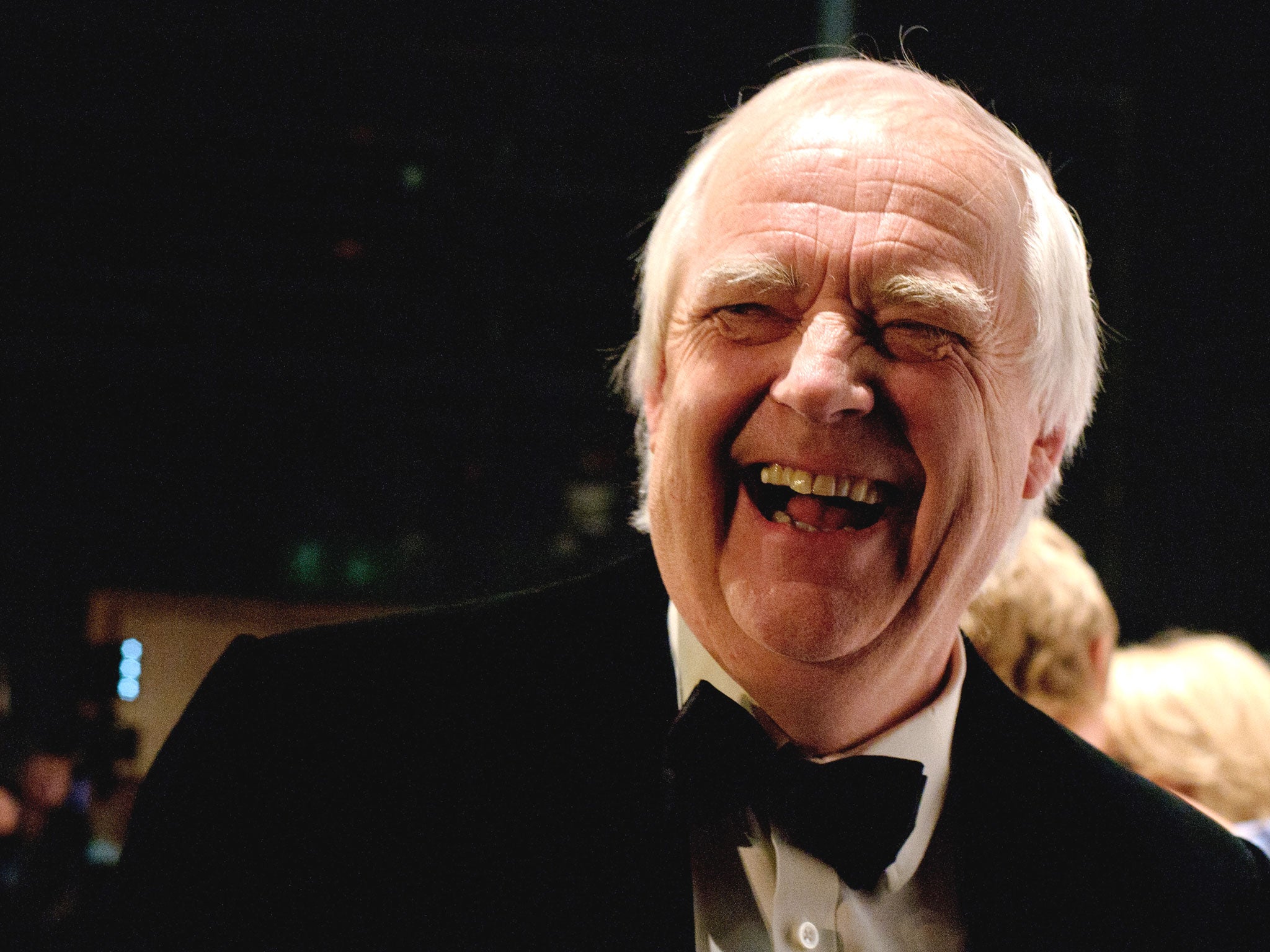 Tim Rice poses in the press room at the Olivier Awards at The Royal Opera House