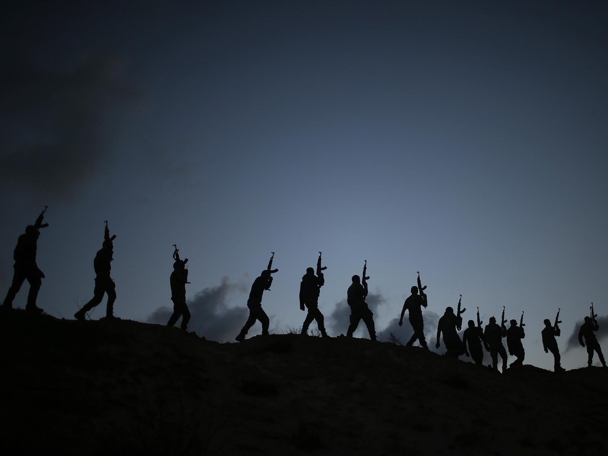 Palestinian Hamas militants march during a training exercise in Gaza