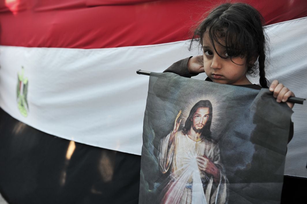 Arab Christians, like this Egyptian Coptic girl exiled in Greece, have left the Middle East in huge numbers