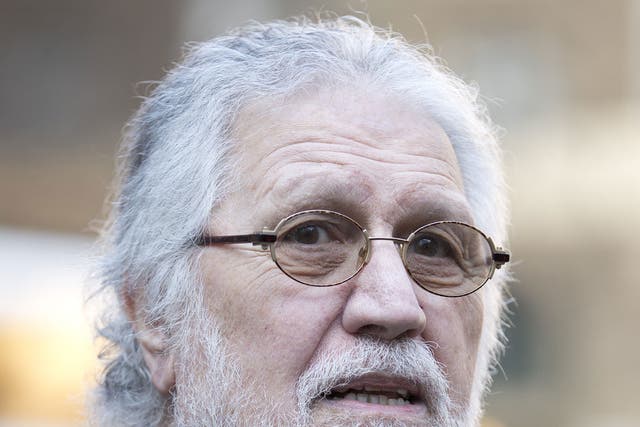 The DJ Dave Lee Travis, arriving at Southwark Crown Court today for a hearing on whether he will face a retrial on two outstanding indecent and sexual assault charges