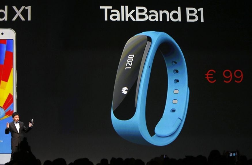 Huawei CEO Richard Yu talks about the TalkBand B1 during a Huawei presentation before the start of the Mobile World Congress in Barcelona, February 23, 2014.