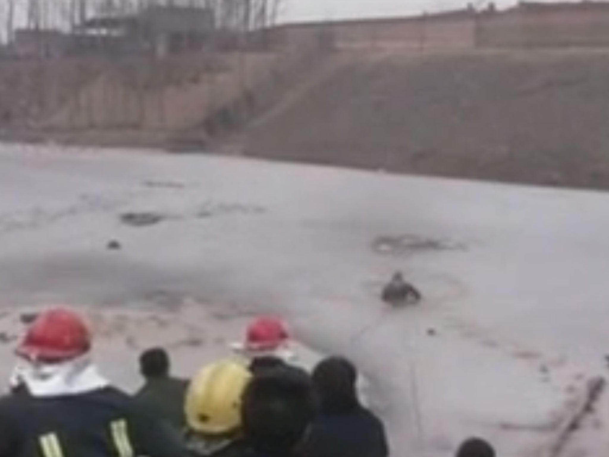 Footage emerged showing the rescue operation on the Huiji River