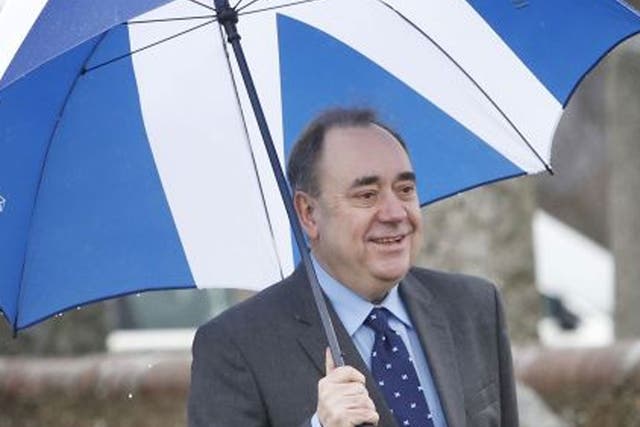 First Minister Alex Salmond  arrives at a meeting of the Scottish Cabinet at Portlethen Parish Church near Aberdeen.