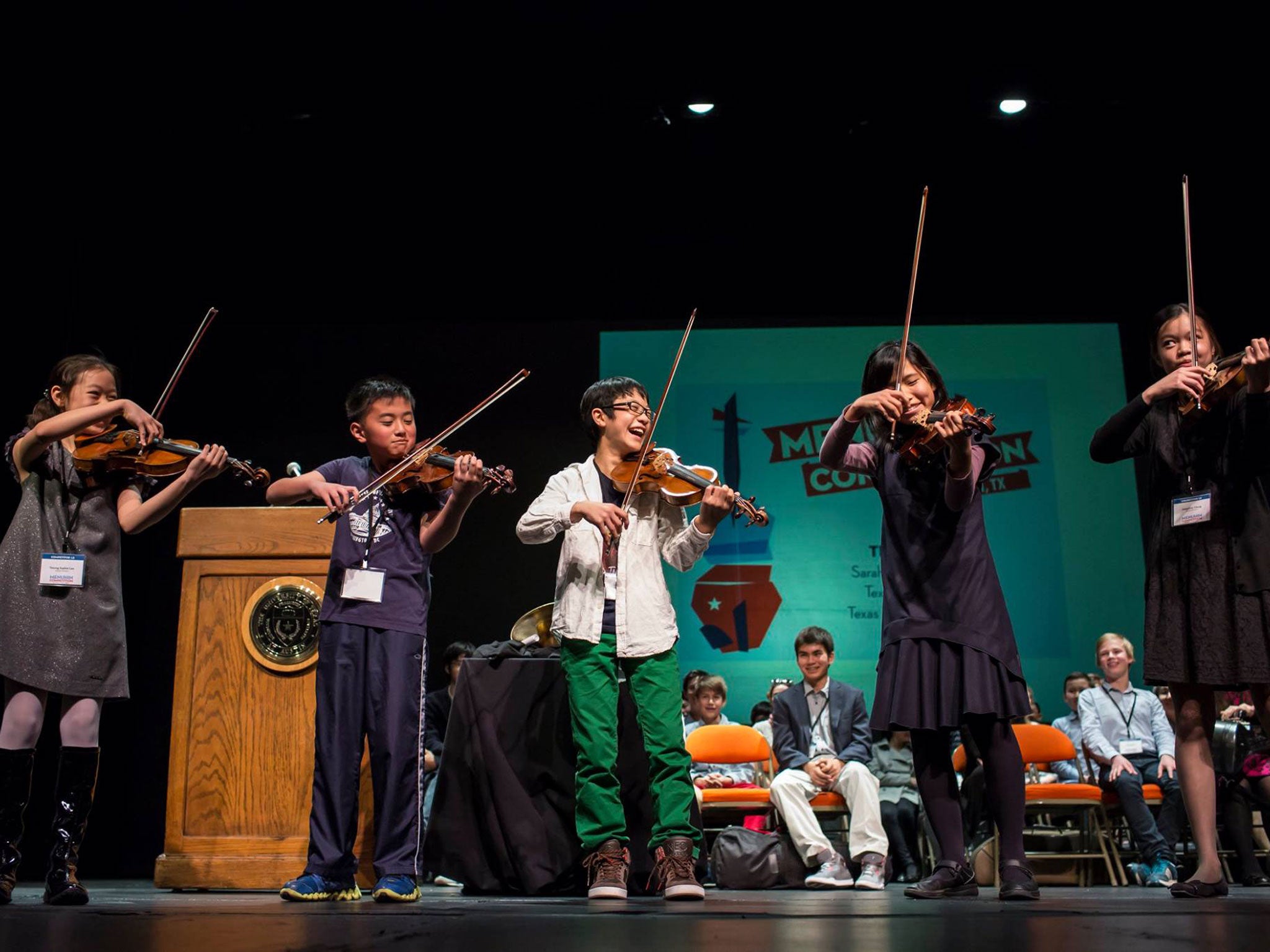 Bow time: young musicians having fun at the opening ceremony of the Britless Yehudi Menuhin Violin Competition
