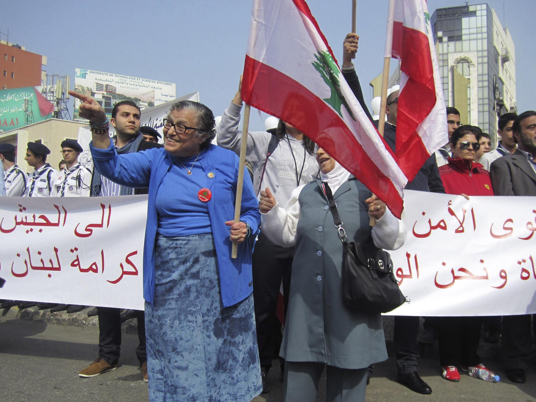 Protesters demand an easing of tension in Tripoli, where two people were killed on Thursday