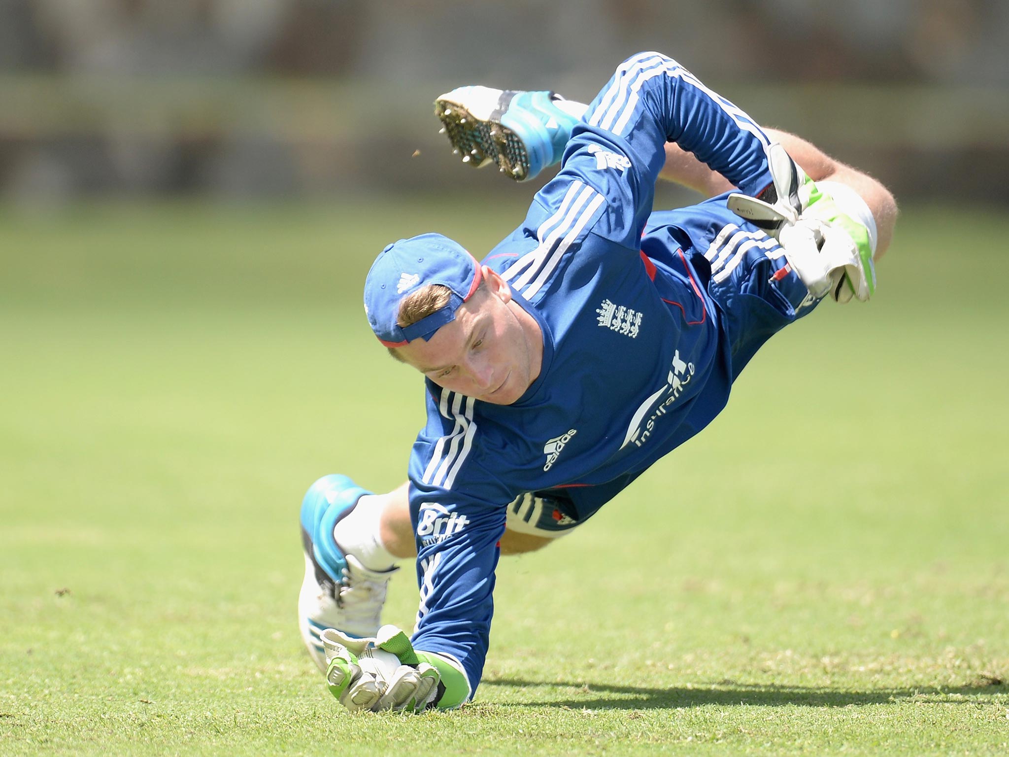 Jos Buttler takes a dive in practice in Antigua yesterday