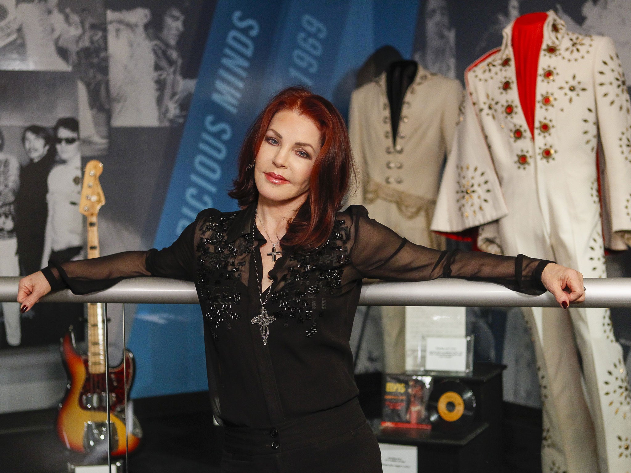 Priscilla Presley stands in the '60 years of Elvis' exhibit inside an annex at Graceland in Memphis