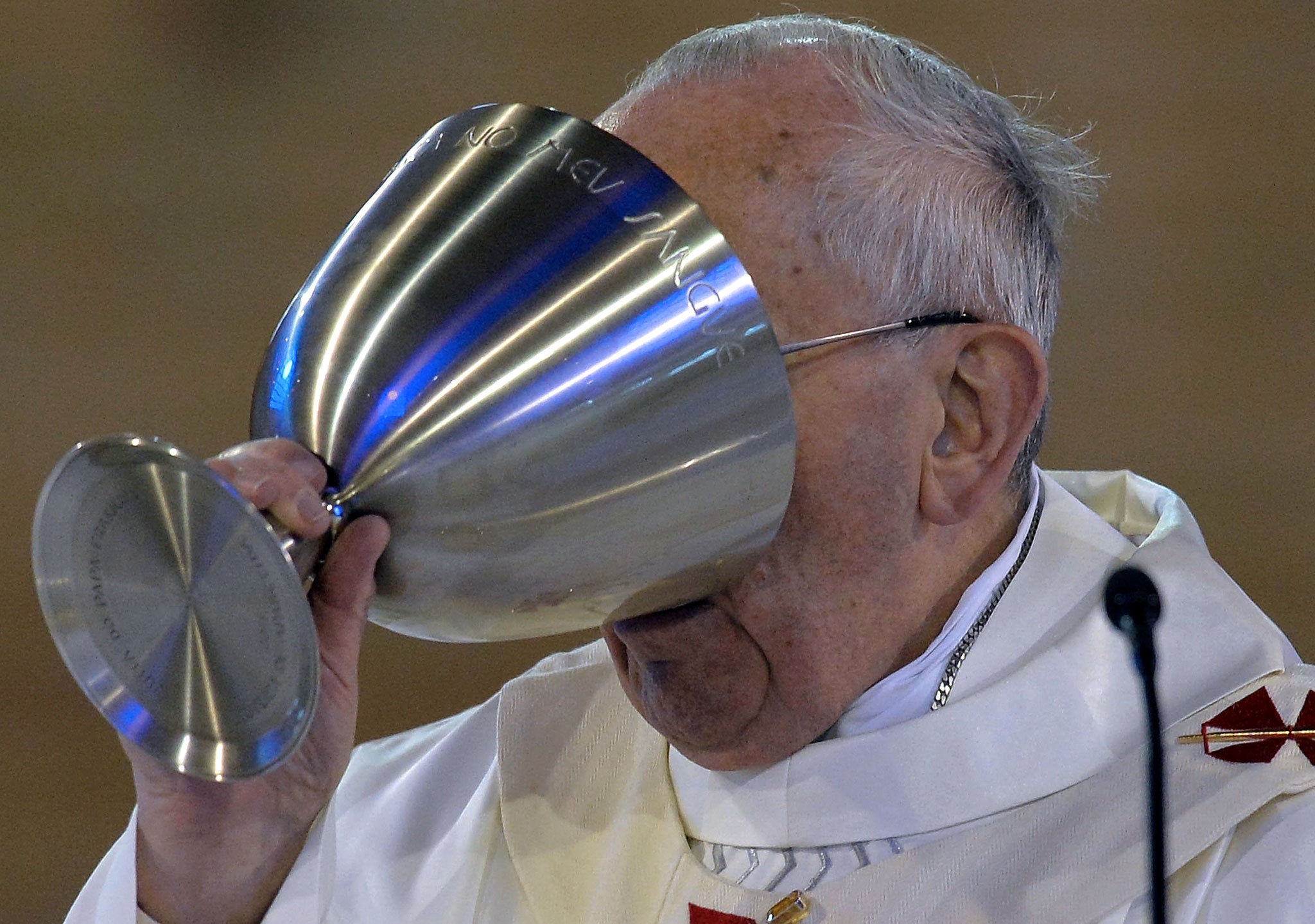 Pope Francis enjoying a glass of wine