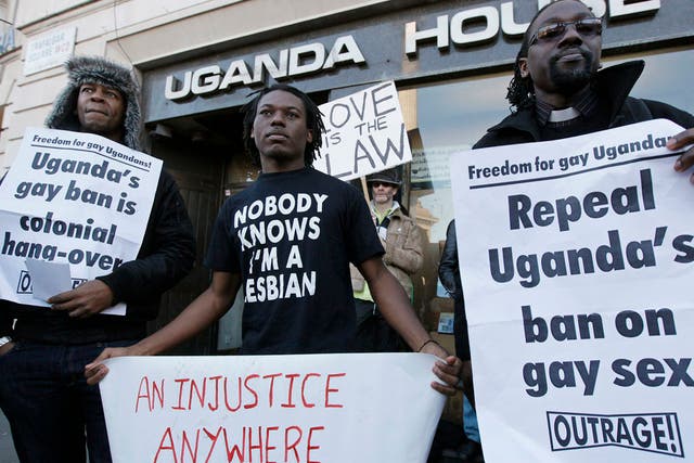Demonstrators protest outside the Ugandan embassy, in central London, on December 10, 2009. Uganda proposed a law which would outlaw gay relationships and threaten homosexuals with the death penalty. The Anti-Homosexuality Bill has sparked outrage around 