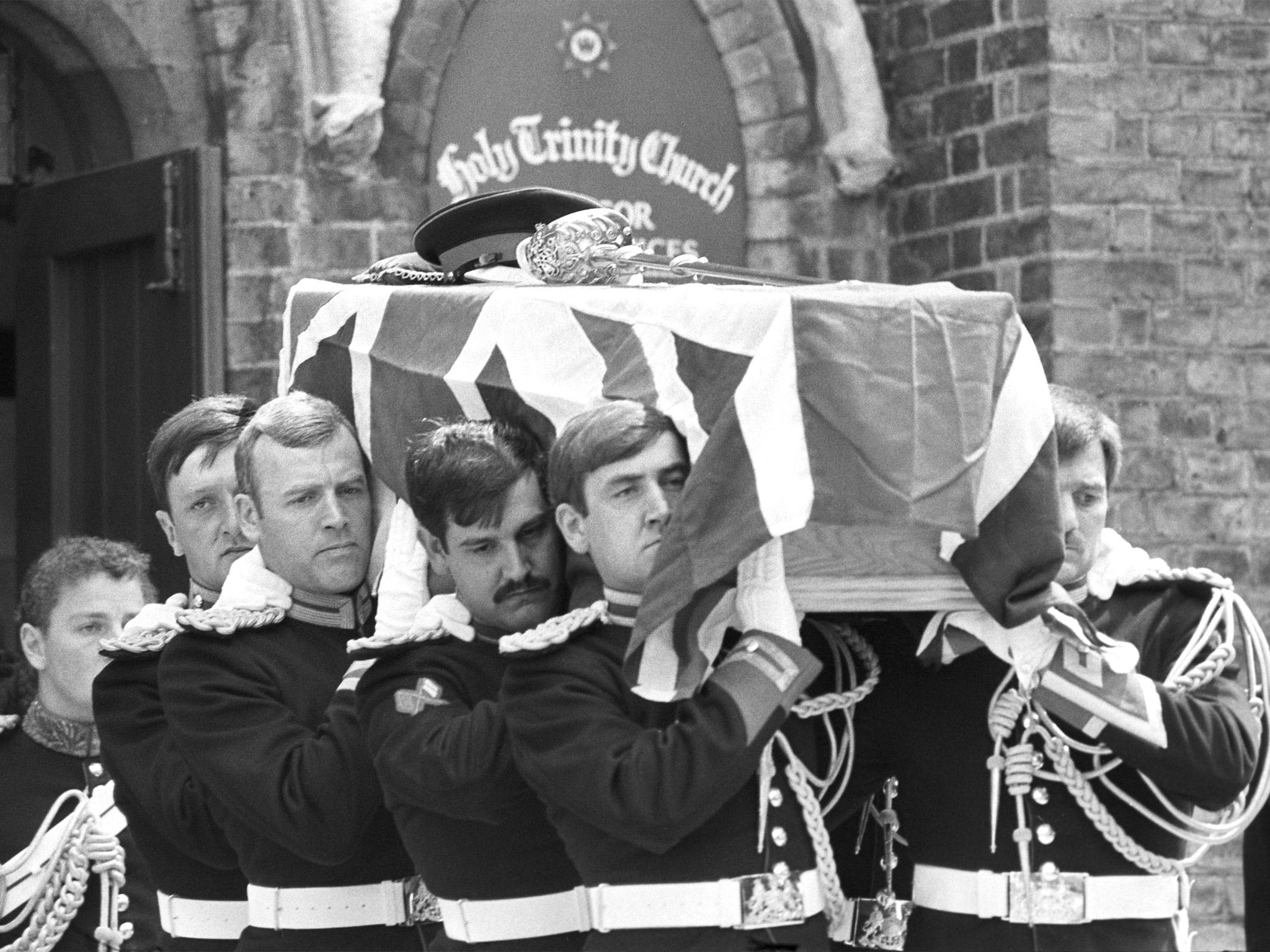 The flag-draped coffin carrying Lt Dennis Daly, the Blues and Royals officer killed in the Hyde Park bombing