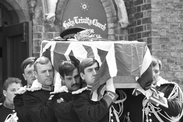 The flag-draped coffin carrying Lt Anthony Daly, the Blues and Royals officer killed in the Hyde Park bombing