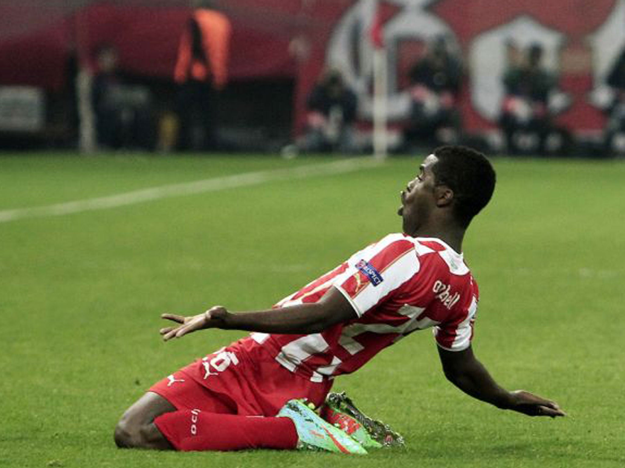 Joel Campbell celebrates his goal for Olympiakos against Manchester United