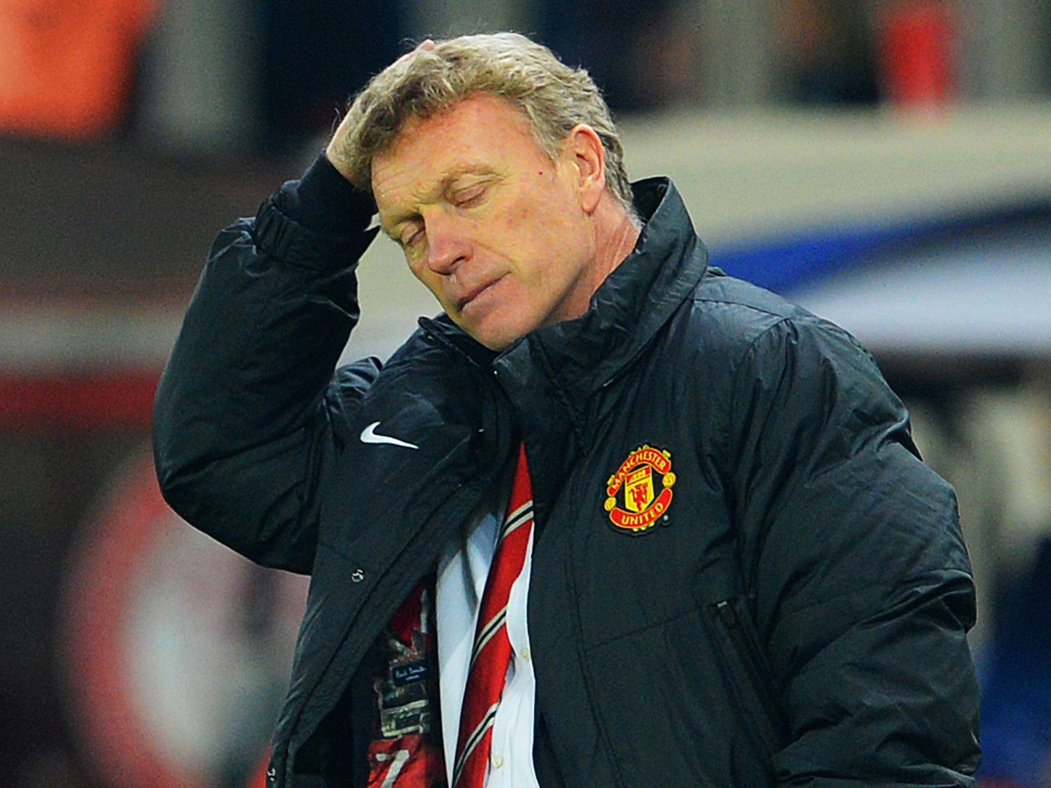 A downbeat David Moyes looks on from the touchline
