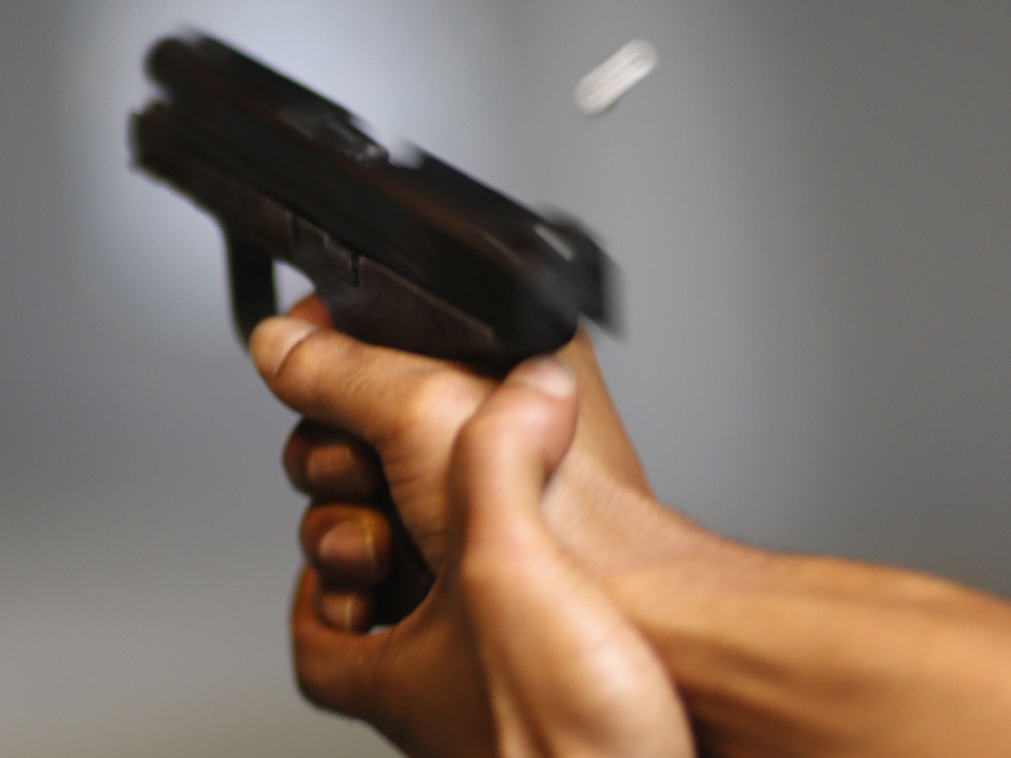 POMPANO BEACH, FL - APRIL 11: As the U.S. Senate takes up gun legislation in Washington, DC , a handgun is used on the indoor firing range at the National Armory gun store on April 11, 2013 in Pompano Beach, Florida. The Senate voted 68-31 to begin debate