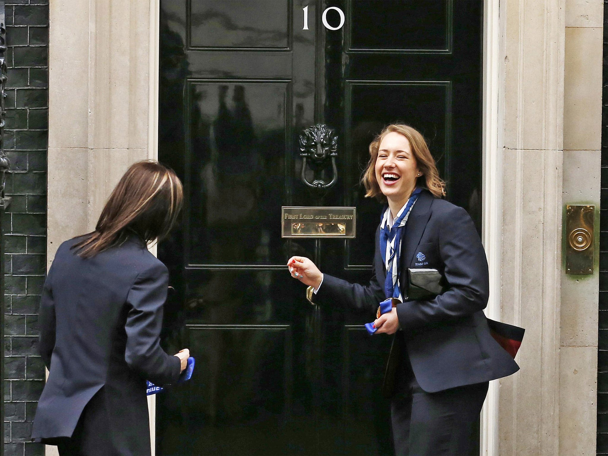 Lizzy Yarnold (right) jokes with curling skip Eve Muirhead in Downing Street