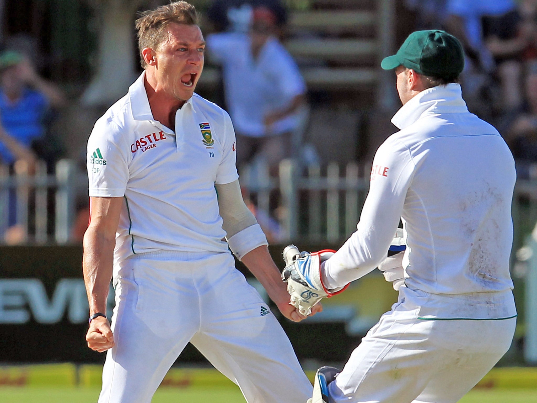 A B de Villiers (right) celebrates another wicket taken during Dale Steyn’s spell of reverse swing