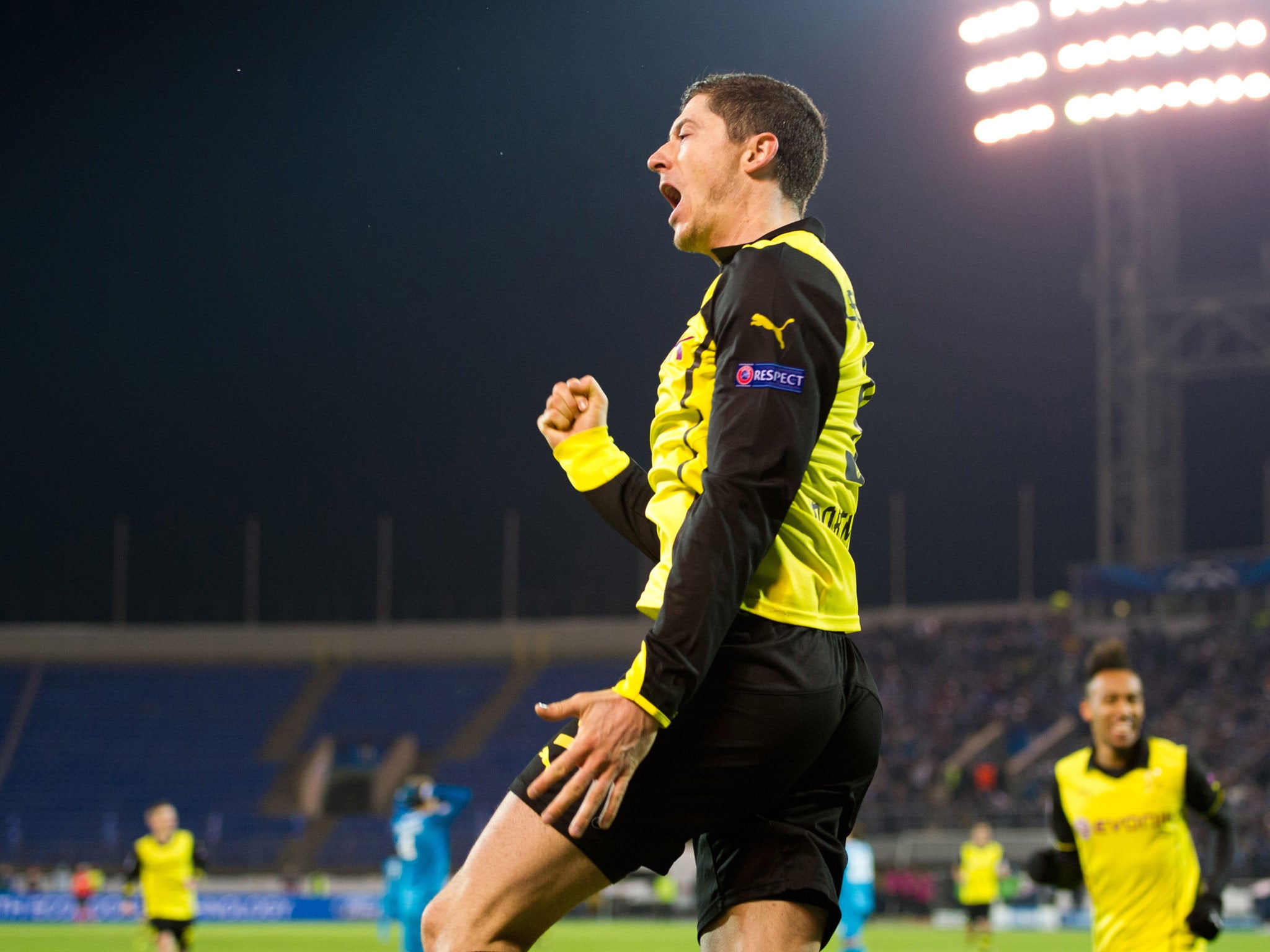 Borussia Dortmund's Robert Lewandowski celebrates after scoring a goal against Zenit St Petersburg during their Champions League last 16, first-leg match