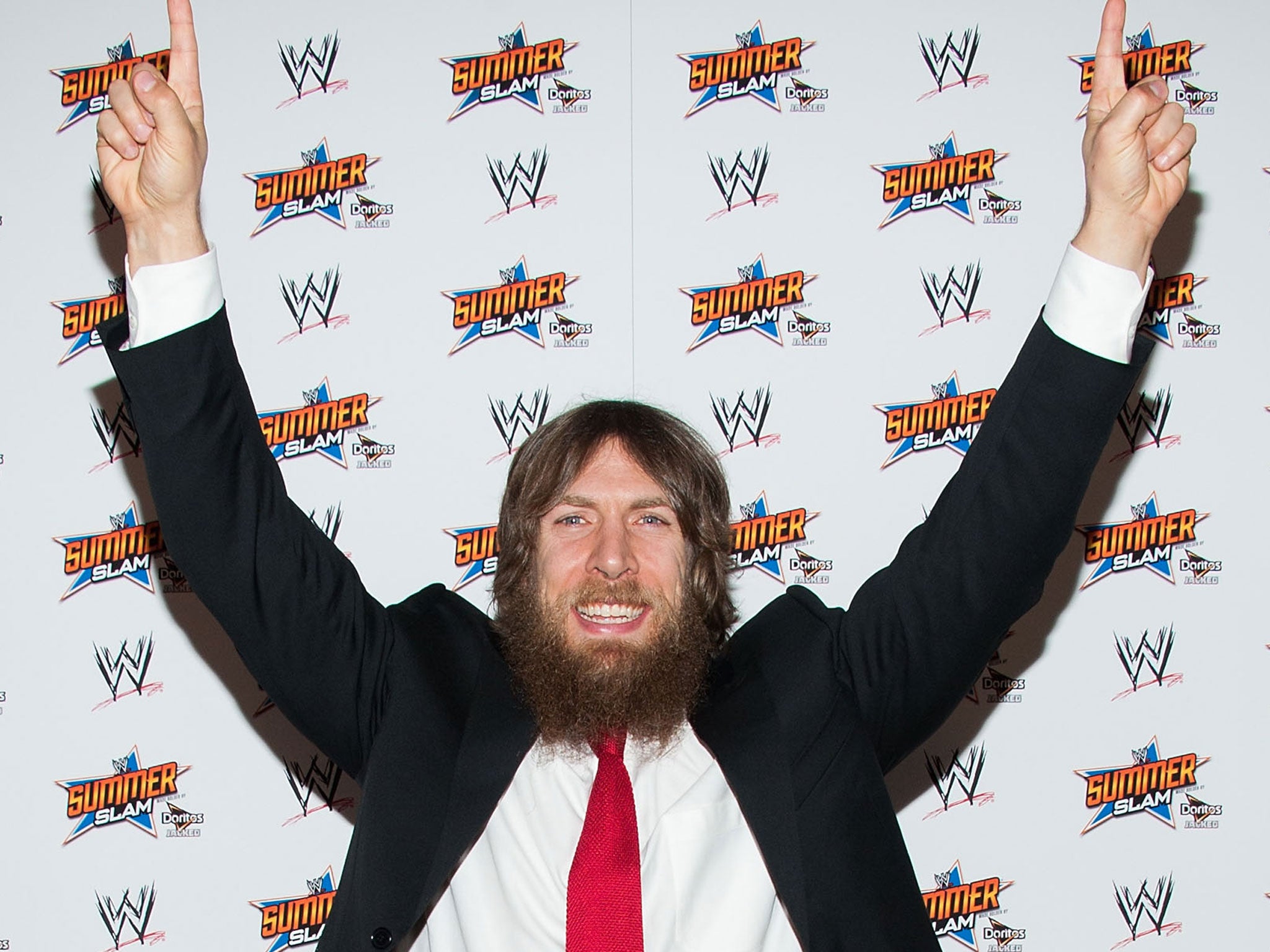 Daniel Bryan makes his signature 'YES!' chant at the SummerSlam press conference last year