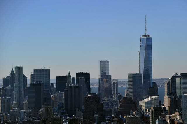View of One World Trade Center, also known as the 'Freedom Tower' and the Manhattan skyline looking south from the Empire State Building February 14, 2014 in New York.