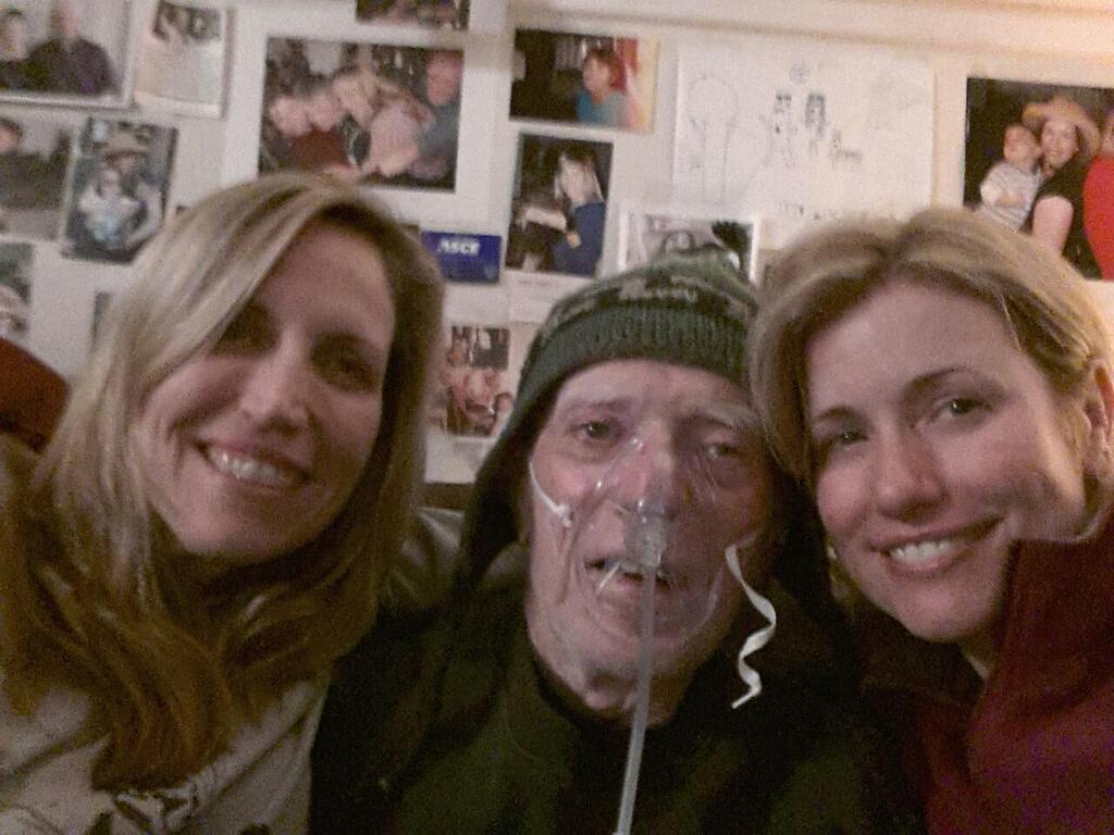 'Surrounding our Dad with love and sarcasm' - Laurie Kilmartin (left), alongside her father Ron and her sister