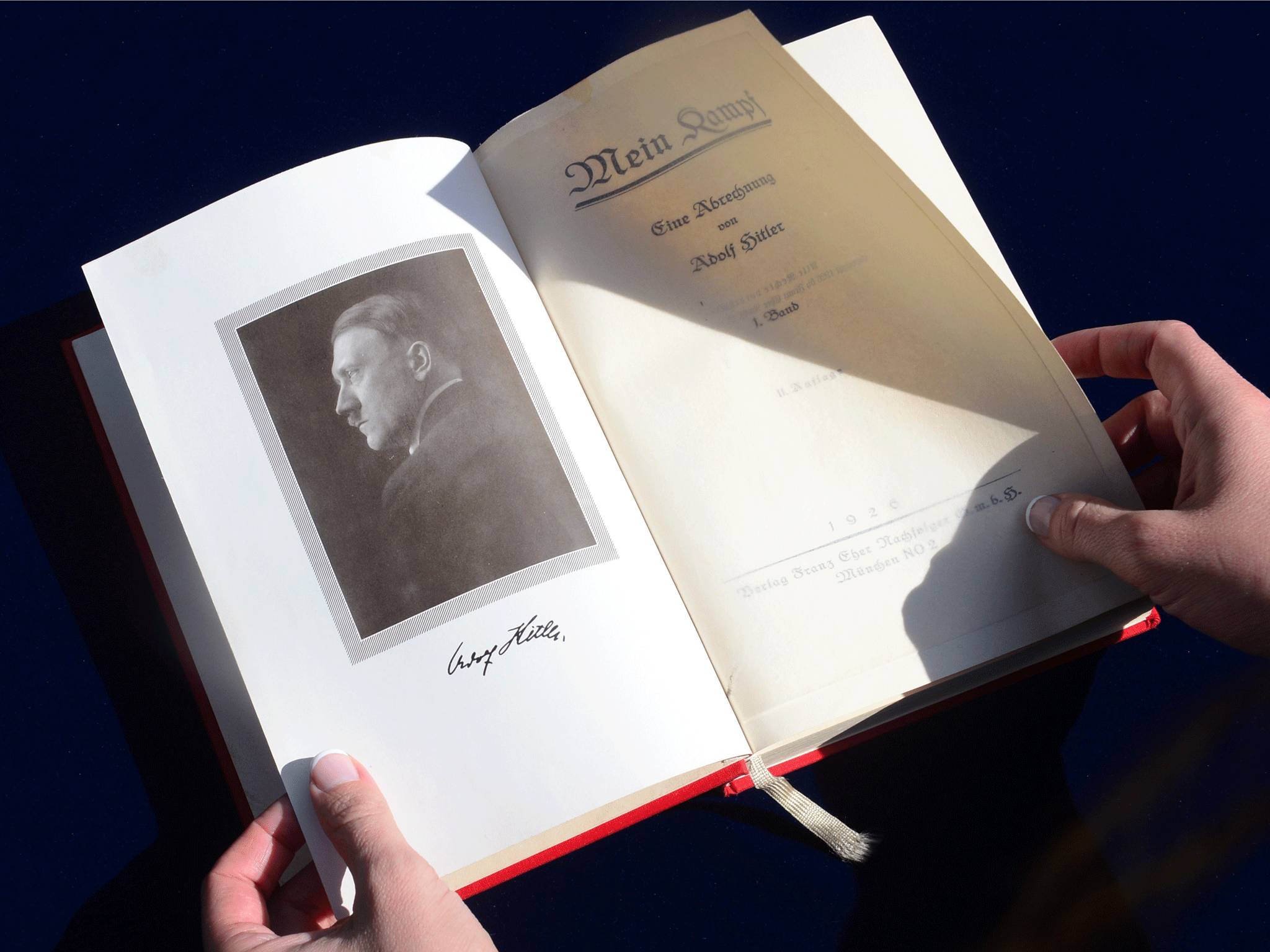 A signed copy of Mein Kampf which Hitler gave to an SS officer as a Christmas gift