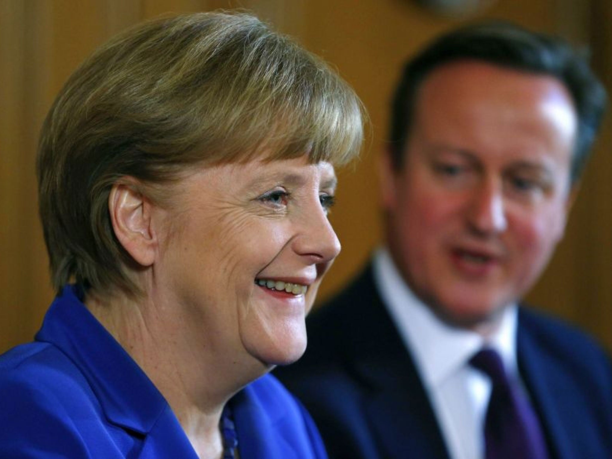 German Chancellor Angela Merkel (L) and Britain's Prime Minister David Cameron address a news conference at 10 Downing Street in London.