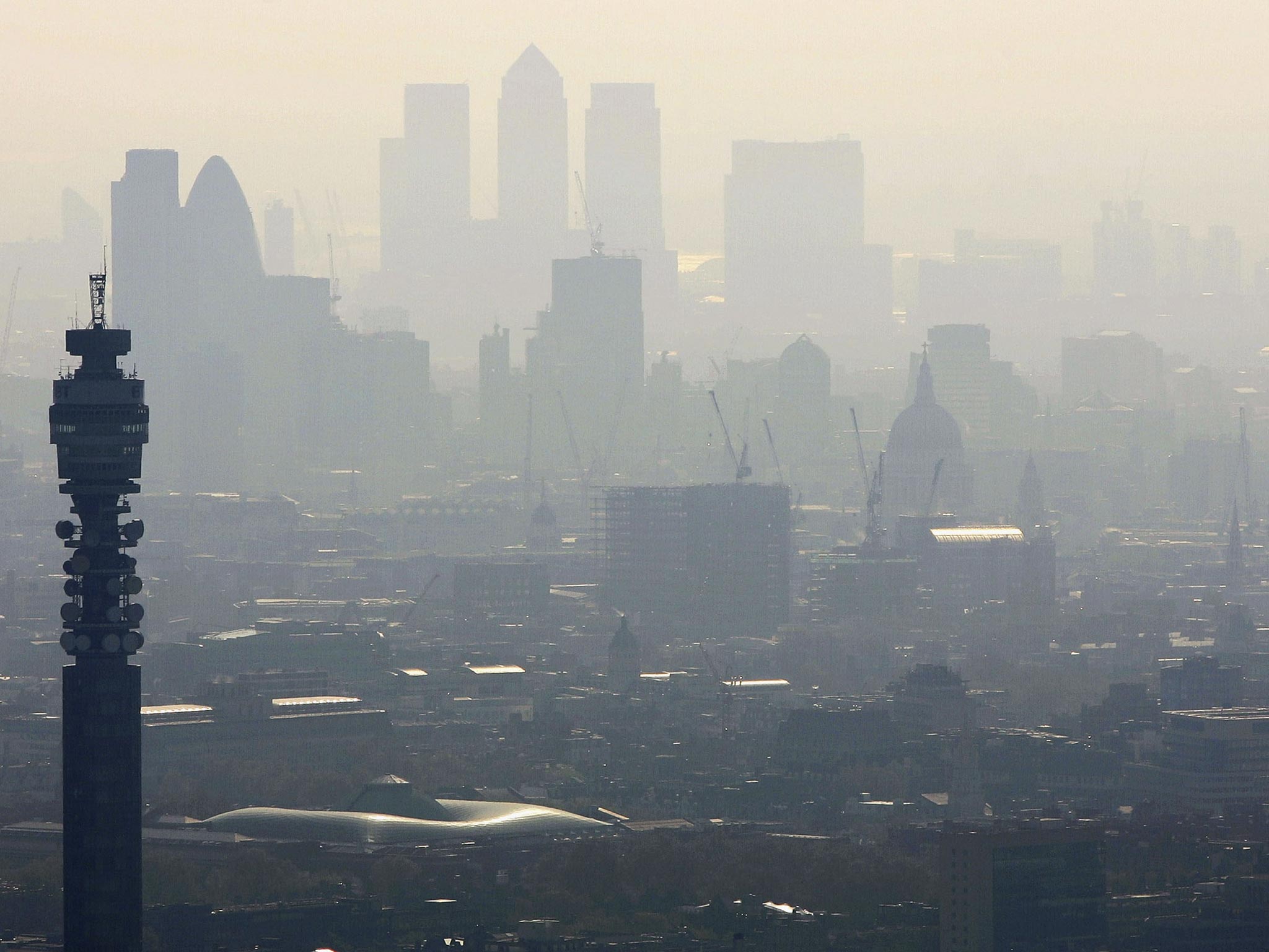 A polluted London skyline during morning rush hour