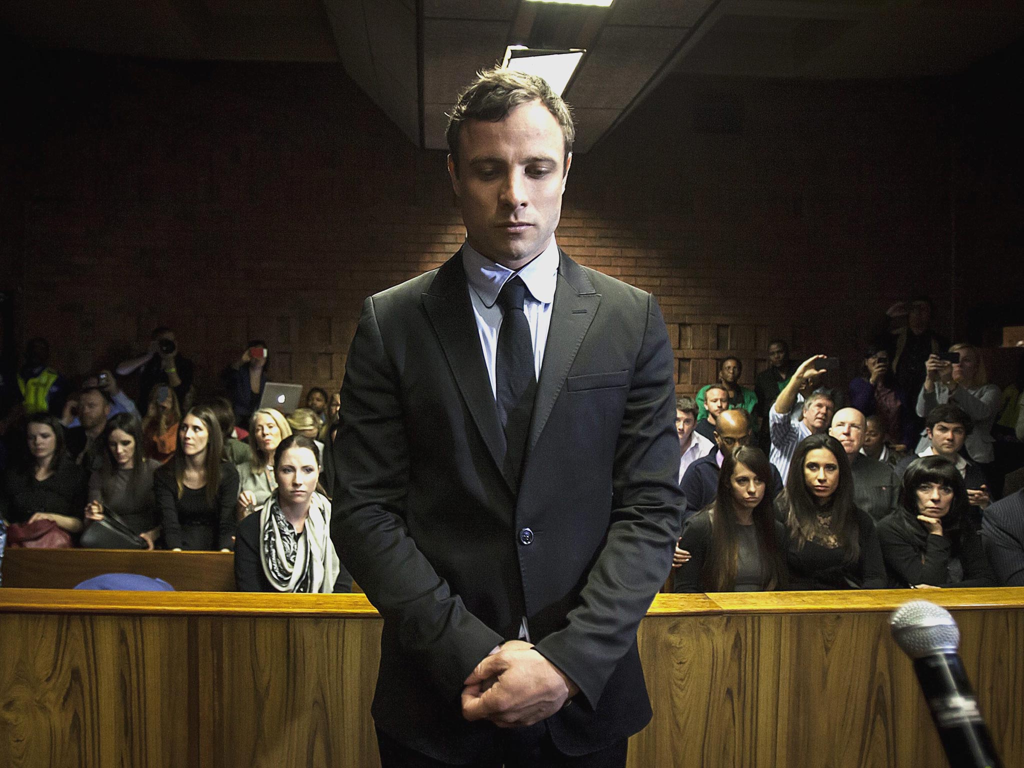 The accused: Oscar Pistorius appears at Pretoria magistrates’ court at a preliminary hearing in August 2013