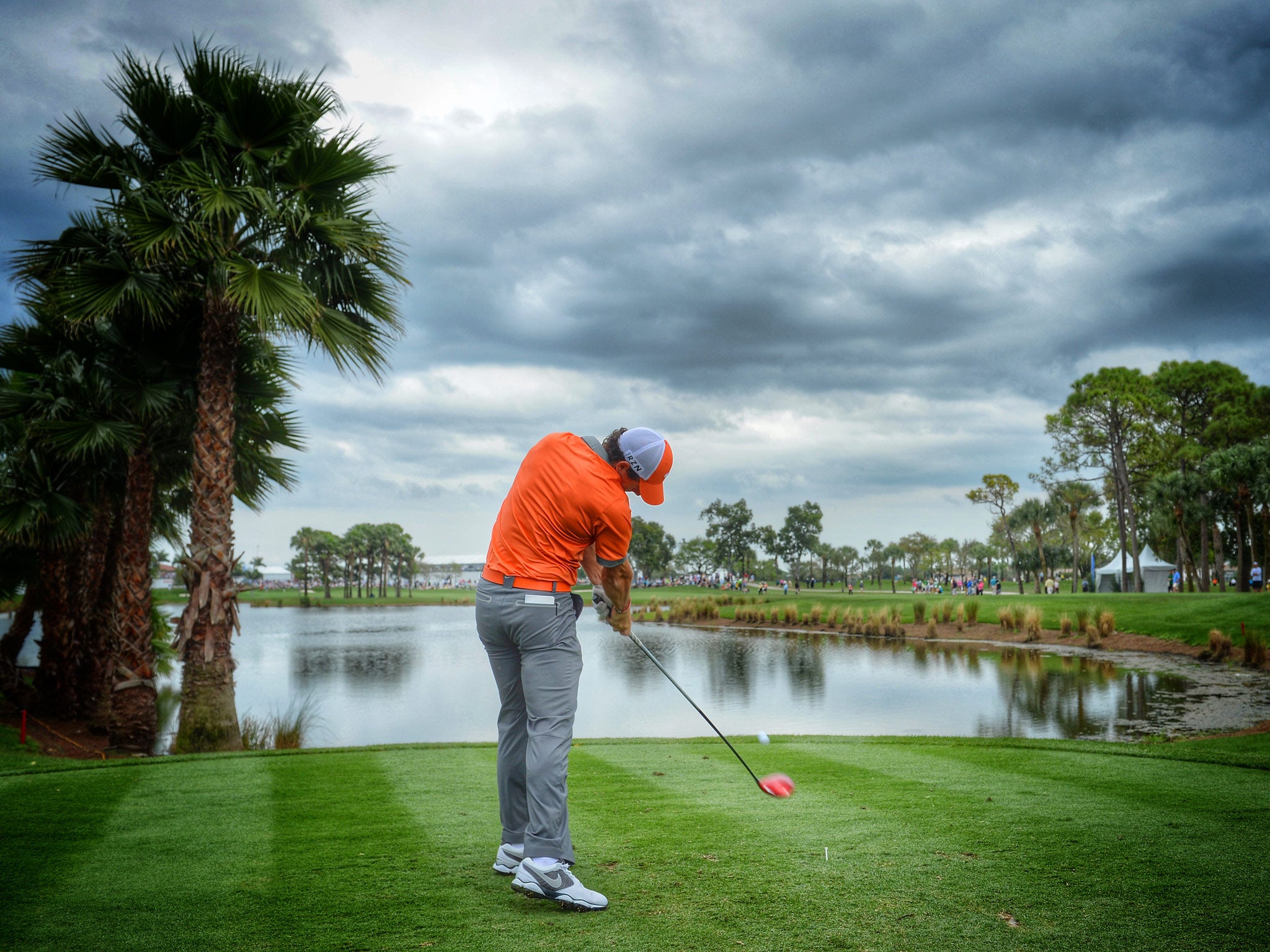Rory McIlroy of Northern Ireland plays a shot during the first round of the Honda Classic