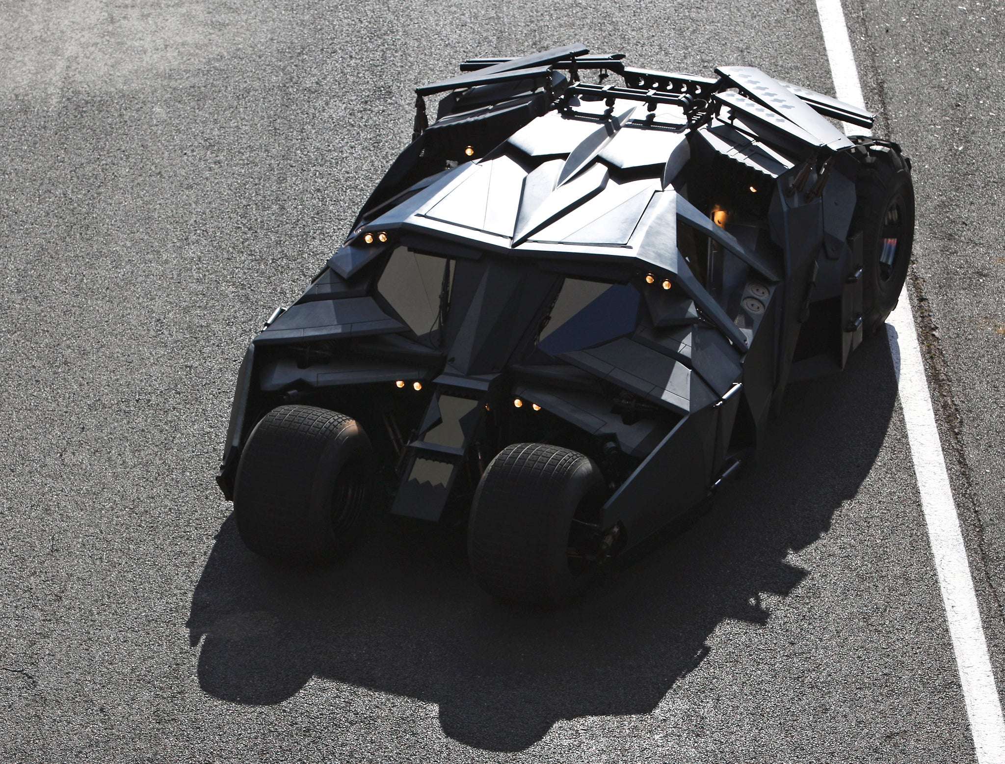 The set of five concept cars were inspired by the Batmobile which features in Batman Begins (pictured)