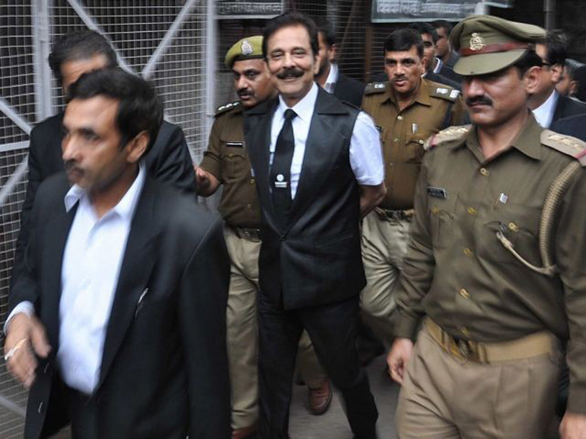 Subrata Roy surrendered to police in the state capital of Uttar Pradesh